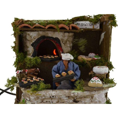 Pastelero en movimiento 10 cm con fuego Mundo Pesebre