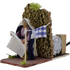 Woman 8 cm in motion hangs the clothes 2