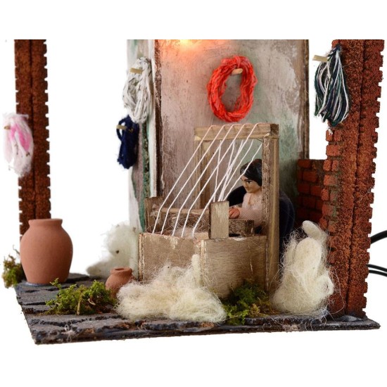 Tessitrice 10 cm in movimento con luce cm 20x18x20 h. Mondo