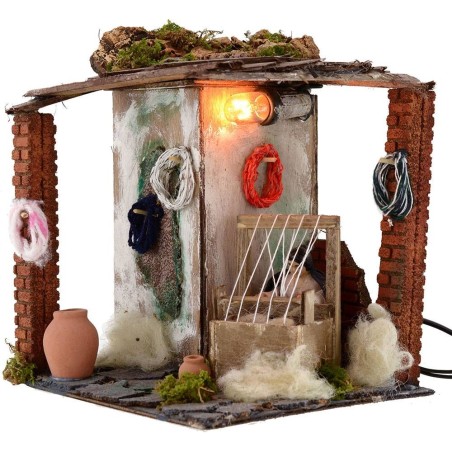 Tejedora de 10 cm en movimiento con luz, 20x18x20 cm de altura. Mundo