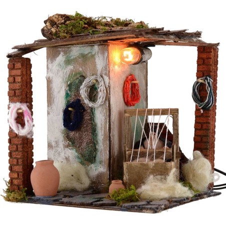 Tejedora de 10 cm en movimiento con luz, 20x18x20 cm de altura. Mundo