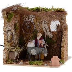 Vecchio cm10 che striglia Asino in movimento 18x20x18 h. Mondo