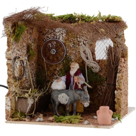 Viejo de 10 cm que cepilla un burro en movimiento 18x20x18 h. Mundo