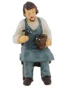 Calzolaio seduto in resina serie 8 cm Mondo Presepi