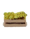 Caja de resina con plátanos de 3,2x2x2,2 cm de altura.