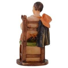 Carpintero sentado en resina serie 12 cm Mundo 2