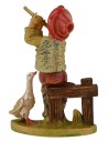 Niño sentado con flauta en pvc lux serie 12 cm