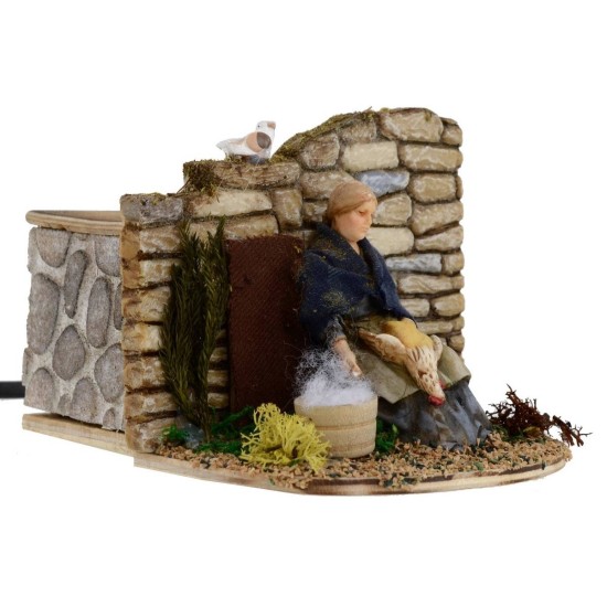 Donna che spenna in movimento serie 10 cm Landi Mondo Presepi