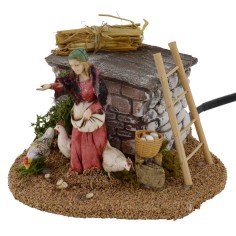 Campesina y gallina con doble movimiento serie 10 cm Landi belén 2