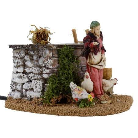 Campesina y gallina con doble movimiento serie 10 cm Landi belén