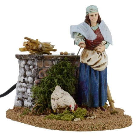 Campesina y gallina doble movimiento 12 cm Landi belén