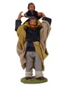 Hombre con niño sobre los hombros 12 cm Lux