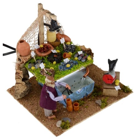 Pescivendolo con vasca di anguille funzionante e luce Mondo