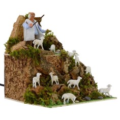 Pastor in motion 10 cm with flock 2