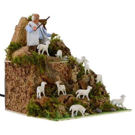 Pastor in motion 10 cm with flock