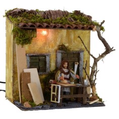 Carpintero en movimiento de 10 cm con casa iluminada Mondo Presepi 2