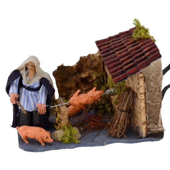 Man at the spiedo in motion with working fire 8 cm