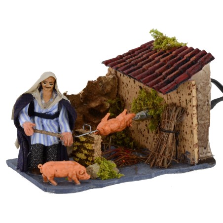 Man at the spiedo in motion with working fire 8 cm