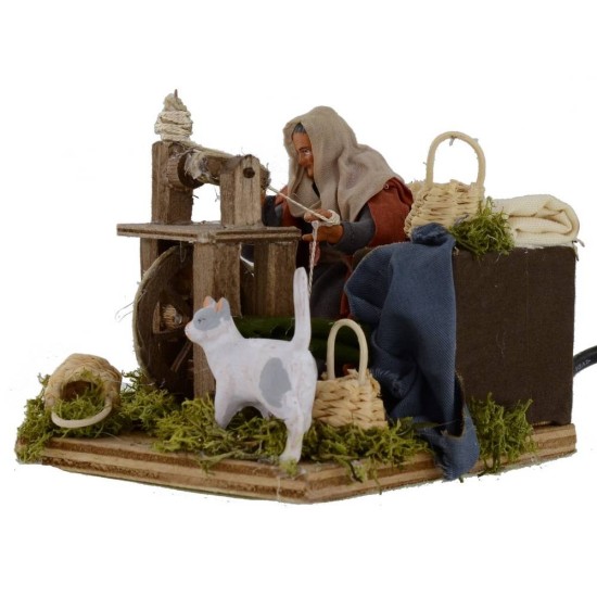 Donna all'arcolaio che fila la lana in movimento serie 12 cm