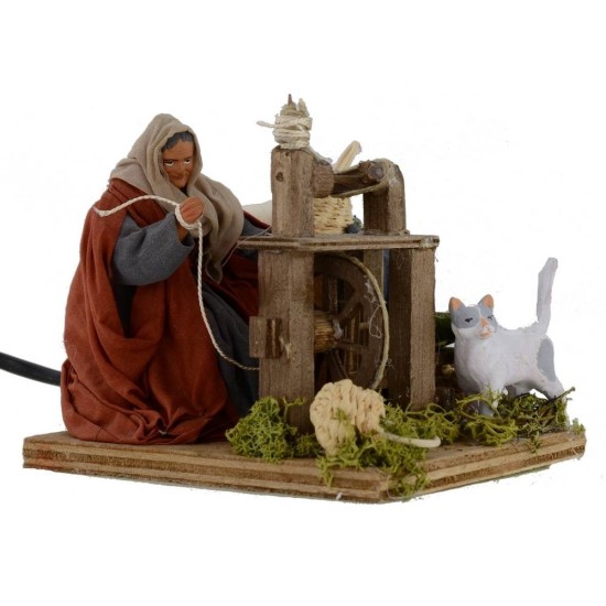 Donna all'arcolaio che fila la lana in movimento serie 12 cm