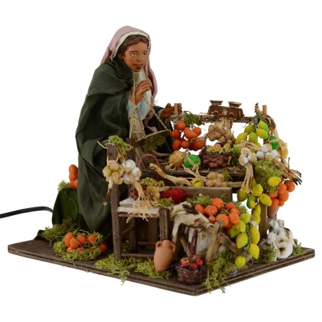Fruttivendola seduta in movimento serie 30 cm Mondo Presepi