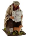 Hombre que lee el periódico en movimiento serie 30 cm