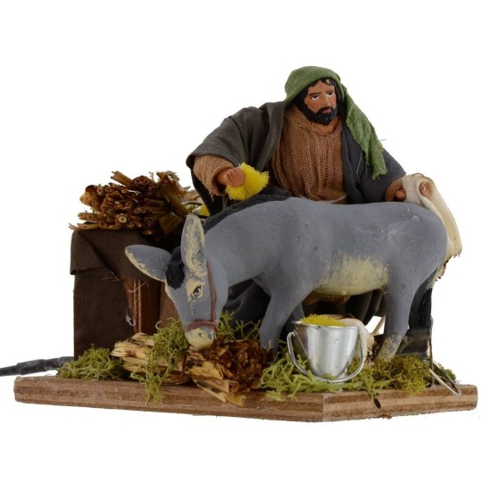 Man who strives donkey in series 12 cm