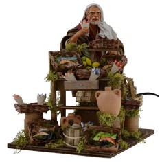 Vendedor de pescado en movimiento 25 cm Mundo Belenes