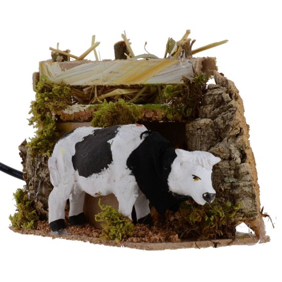 Bue que come en movimiento cm 14x9x12 h Mundo