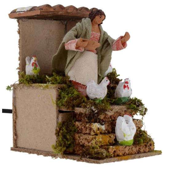 Donna che ciba le galline in movimento 10 cm Mondo Presepi