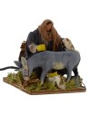 Hombre que cepilla burro en movimiento serie 12 cm Mundo Pesebres