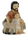 Pastor sentado con niño y cordero serie 9 cm en resina