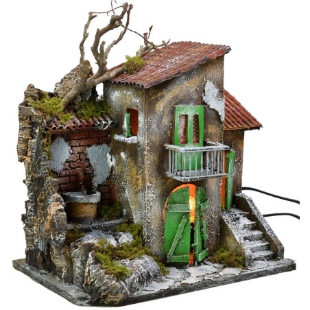 Illuminated house with functioning fountain cm 30x21x35 h