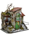 Casa iluminada con fuente funcionando de 30x21x35 cm h