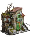 Casa iluminada con fuente funcionando de 30x21x35 cm h