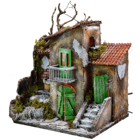 Casa iluminada con fuente funcionando de 30x21x35 cm h