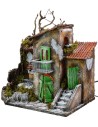 Casa iluminada con fuente funcionando de 30x21x35 cm h