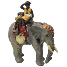 Boy on elephant series 12 cm in resin