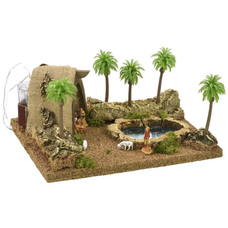 Illuminated Arab tent complete with Landi statues with pond and