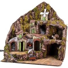 Illuminated nativity scene with functioning fountain, fire and 2