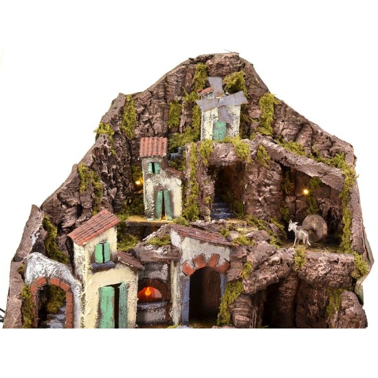 Illuminated nativity scene with functioning fountain, fire and