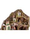 Illuminated nativity scene complete with Landi statues with fountain, fire