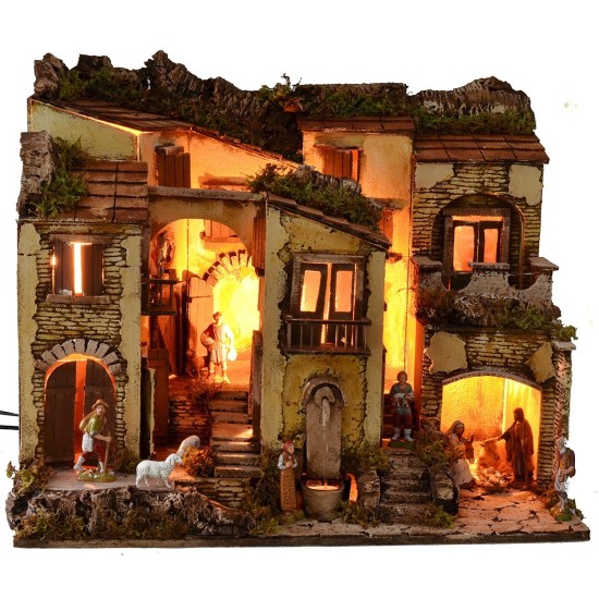 Pesebre iluminado completo con estatuas Landi y fuente
