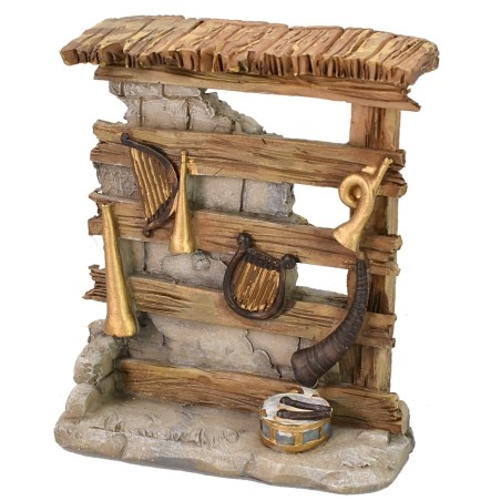 Tienda en resina con instrumentos musicales 9,5x3,7x11 cm h.