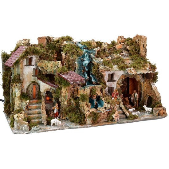 Illuminated nativity scene complete with Landi statues and double waterfall