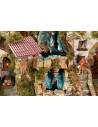 Illuminated nativity scene complete with Landi statues and double waterfall