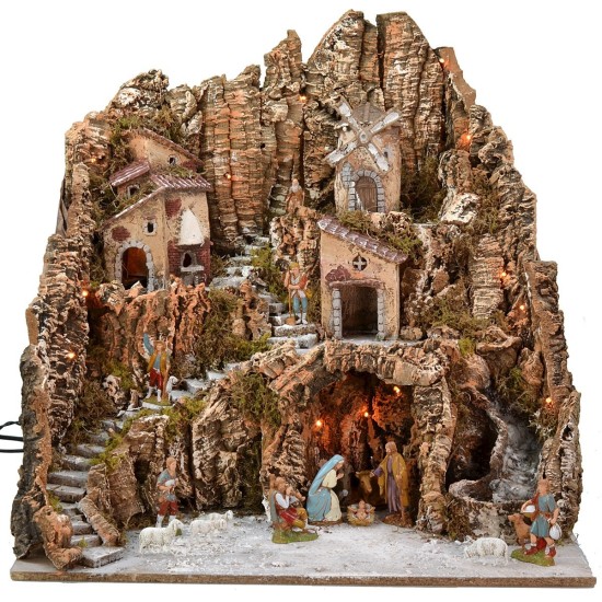 Belén iluminado completo con figuras Landi y molino de viento.