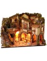 Illuminated nativity scene complete with Landi statues and waterfall