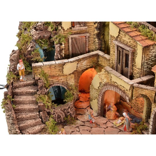 Illuminated nativity scene complete with Landi statues with