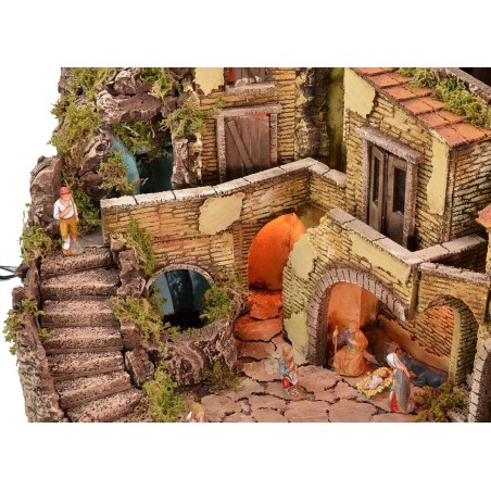 Presepe illuminato completo di statue Landi con cascata
